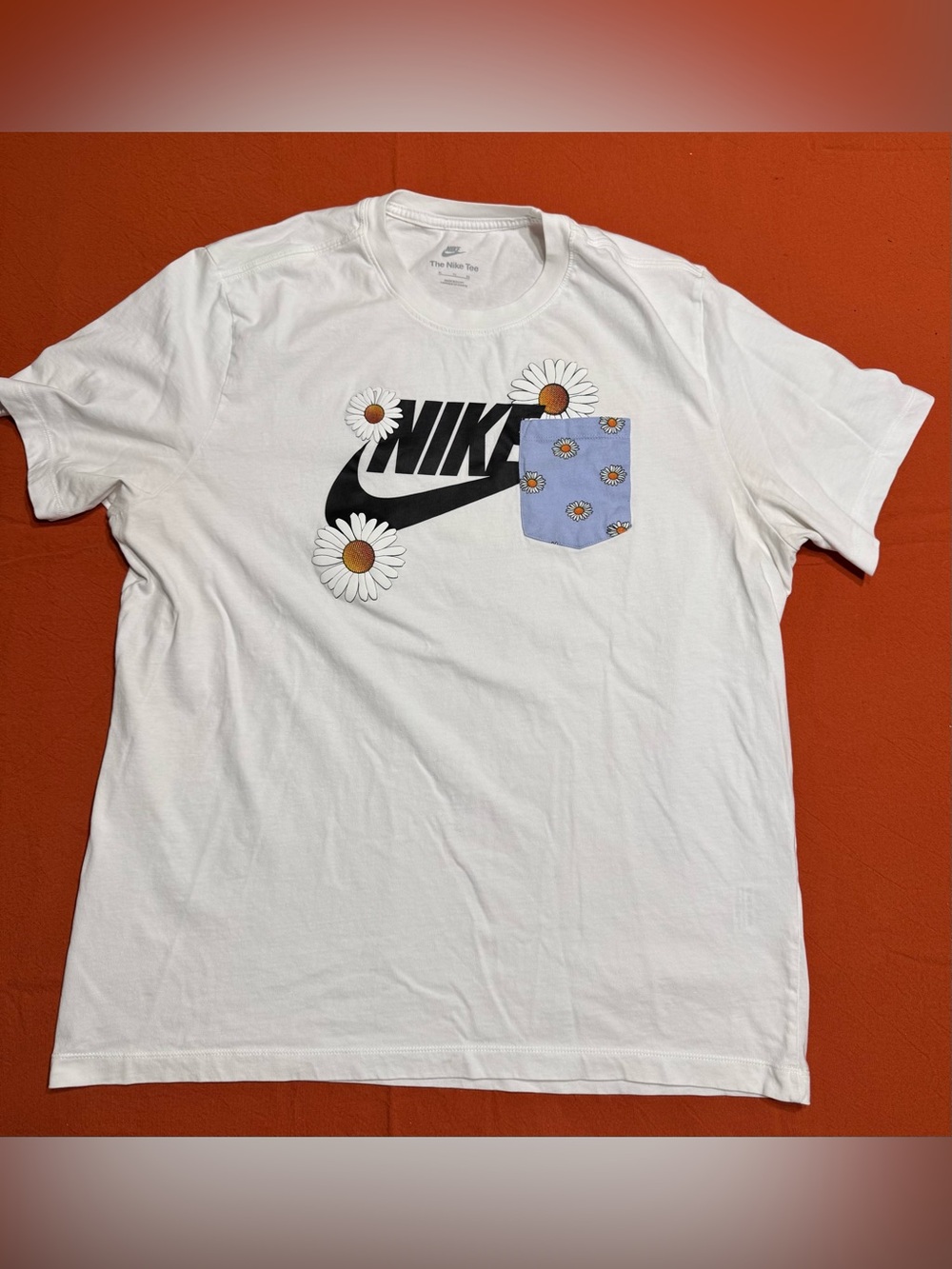 Nike White Short-Sleeve Daisy Pocket Tee with Black Logo